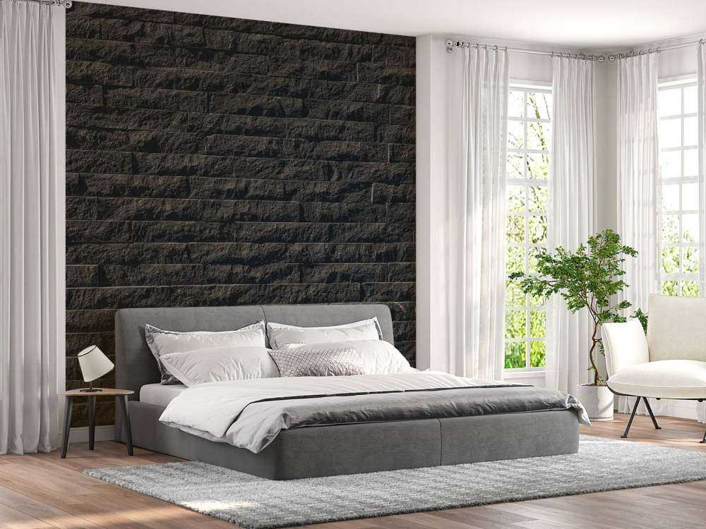 Muur met donkere stenen