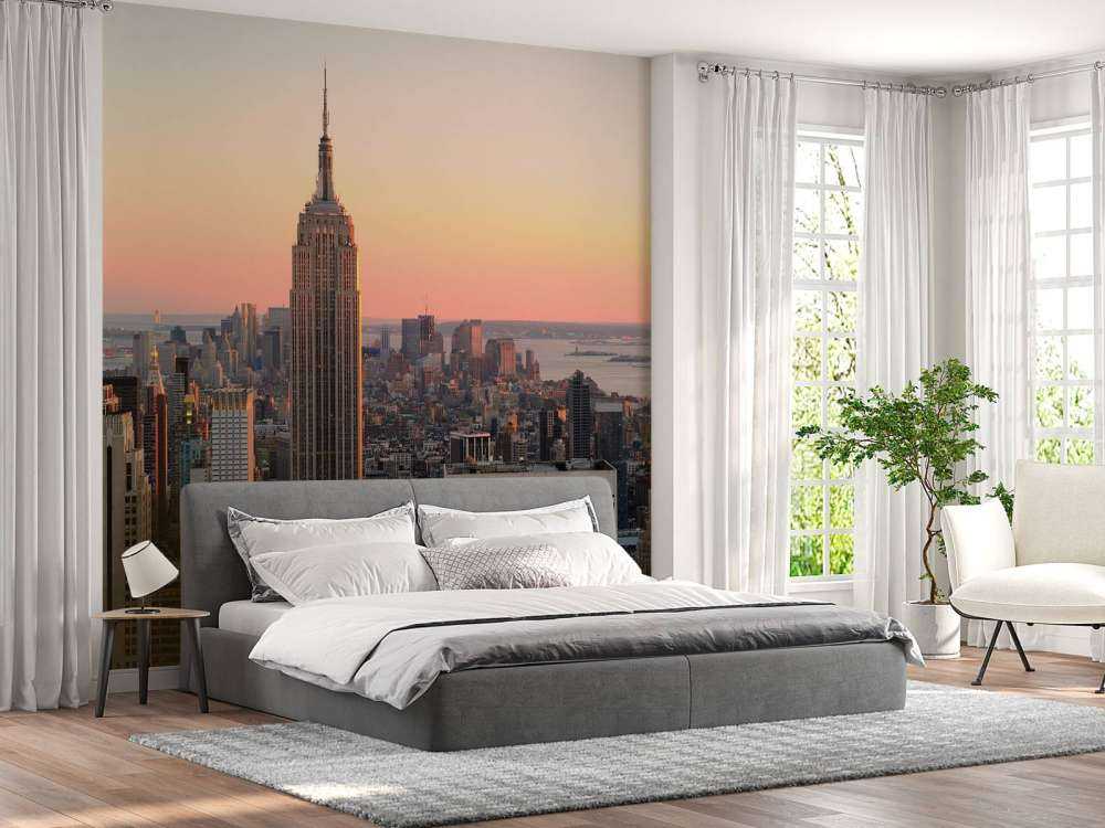 De Skyline van New York bij zonsondergang