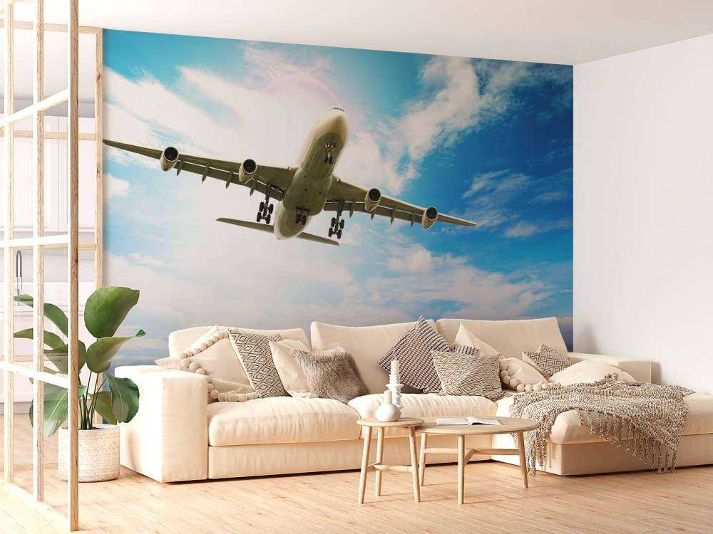 Passagiersvliegtuig boven een tropische zee