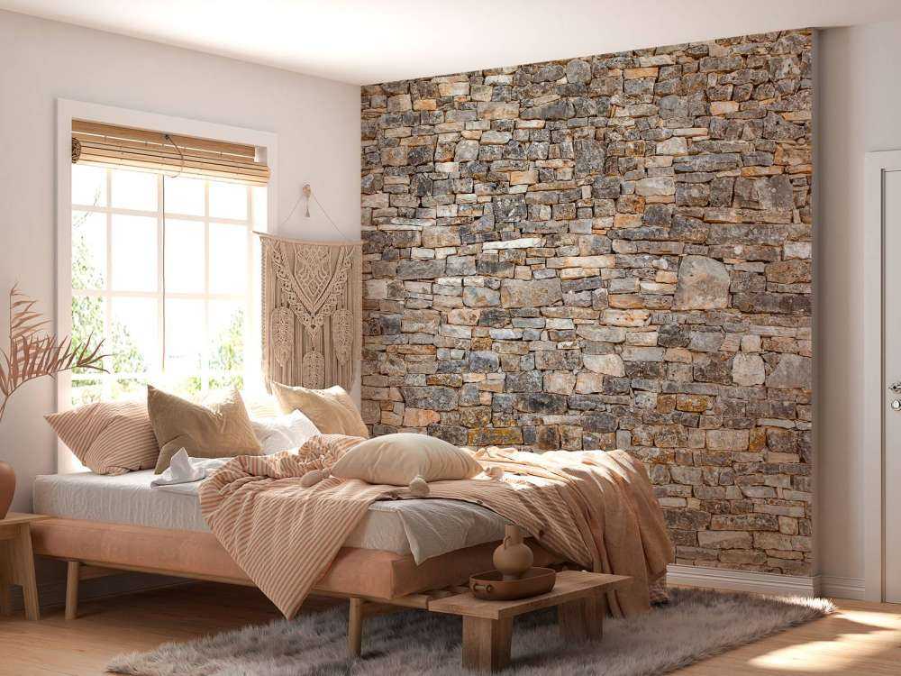 Muur van kleurrijke keien