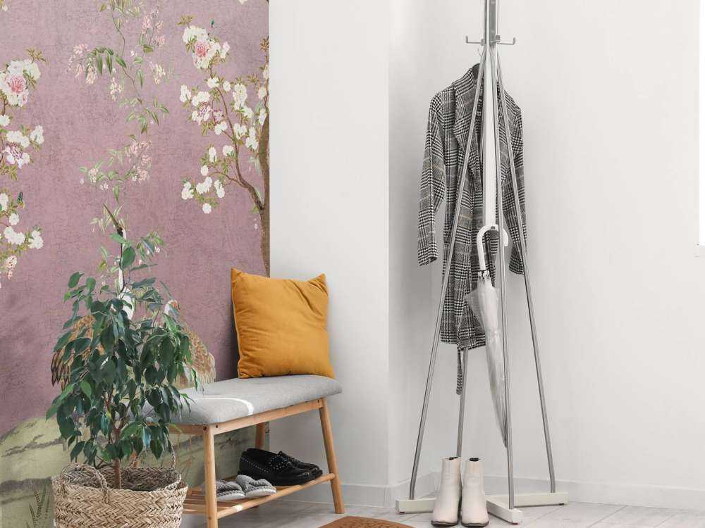 Kraanvogels onder bloesemroze hemel