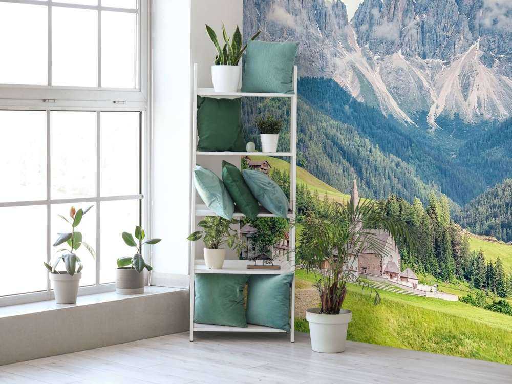 Alpendorp in groene vallei