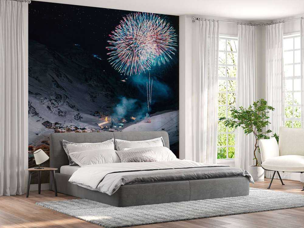 Vuurwerk boven winters bergdorp