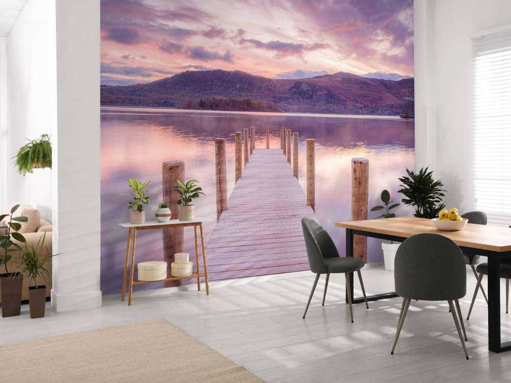 Houten steiger bij zonsondergang