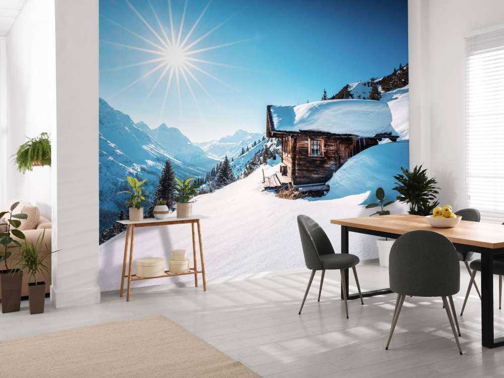 Winterzon boven houten berghut