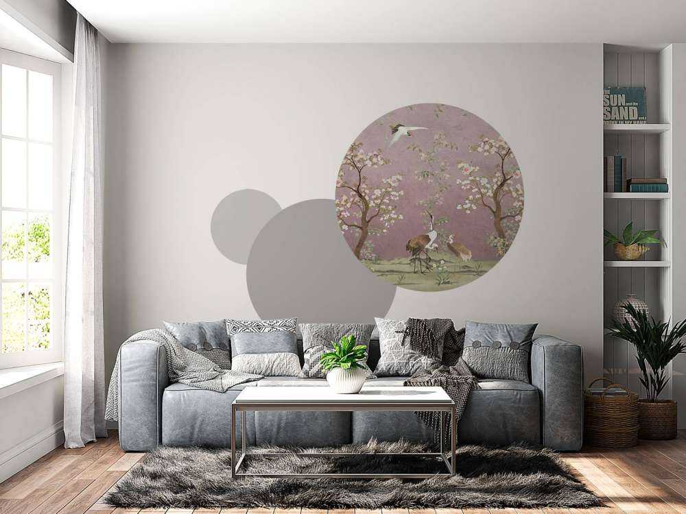 Kraanvogels onder bloesemroze hemel