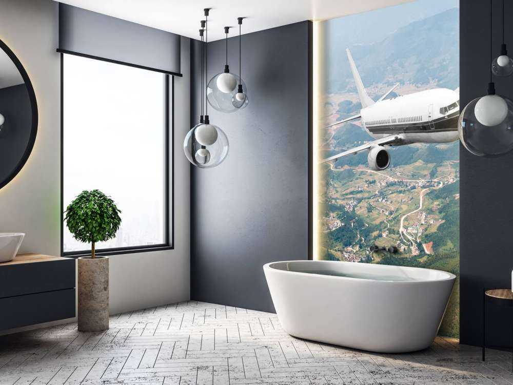 Passagiersvliegtuig boven een berglandschap