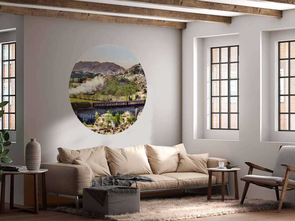 Stoomtrein door een prachtig landschap in Schotland