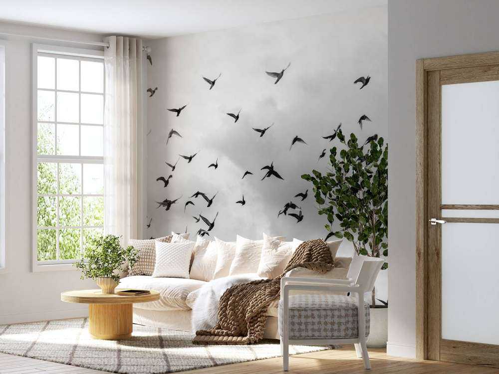 Vliegende duiven in zwart-wit