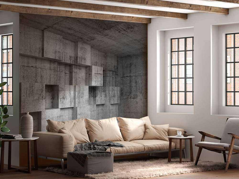 Lege betonnen interieur met decoratie kubussen op de muur