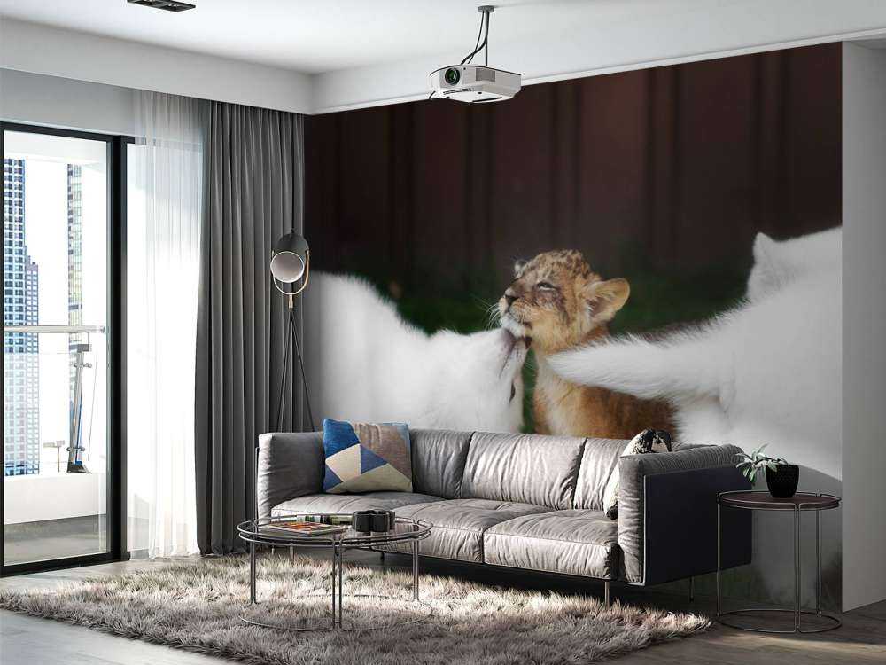 Welpje speelt met Zwitserse witte herders