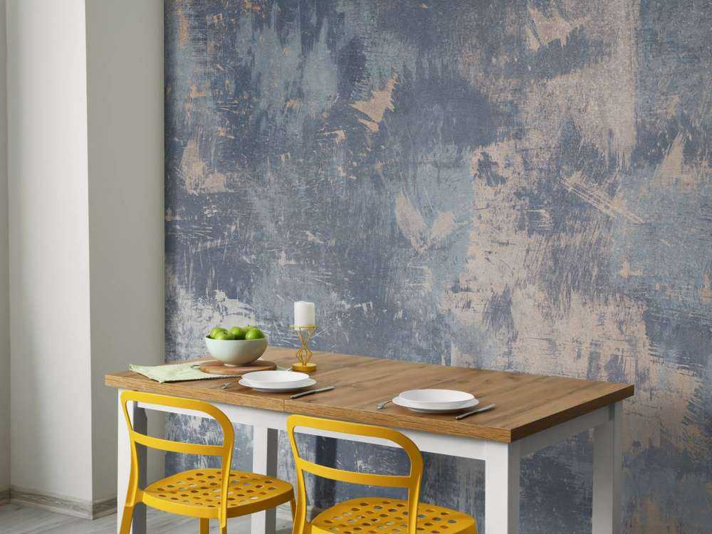 Beschadigde betonnen muur