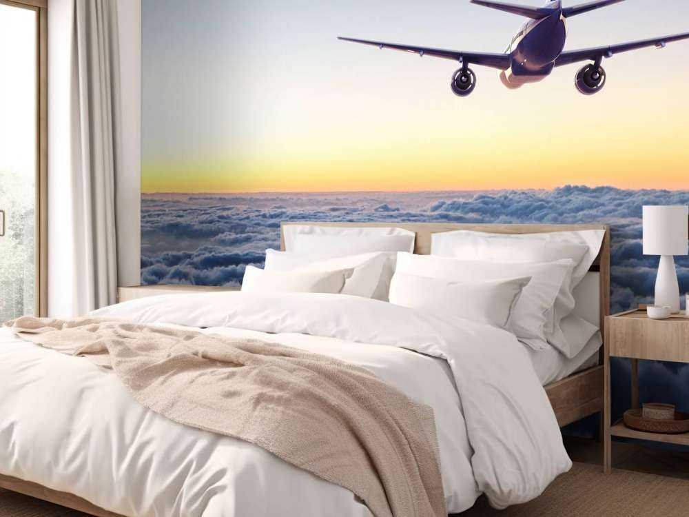 Vliegtuig in de avond boven de wolken