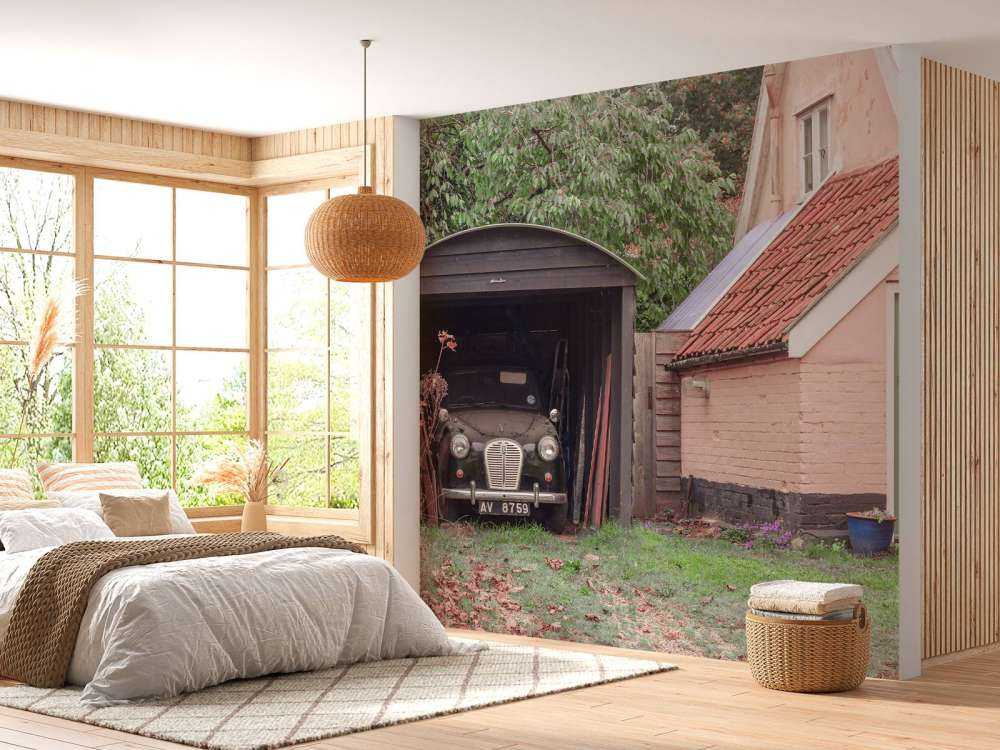 Classic car in garage of old house