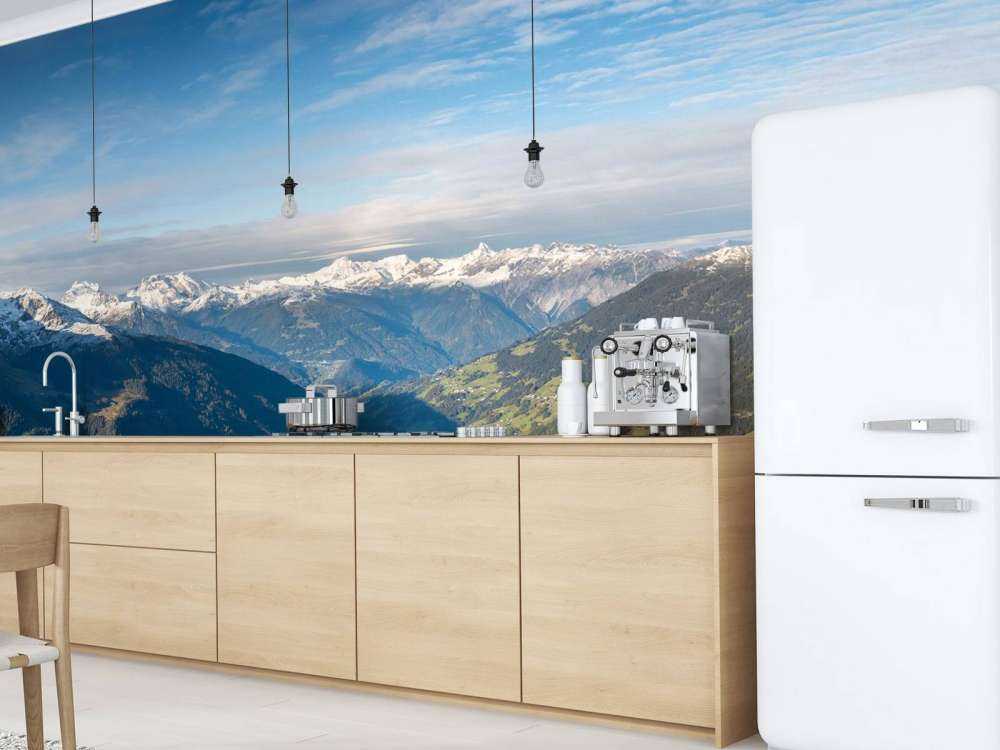 Panorama over besneeuwd alpendal