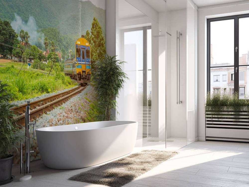 Trein door een dorpje in Thailand