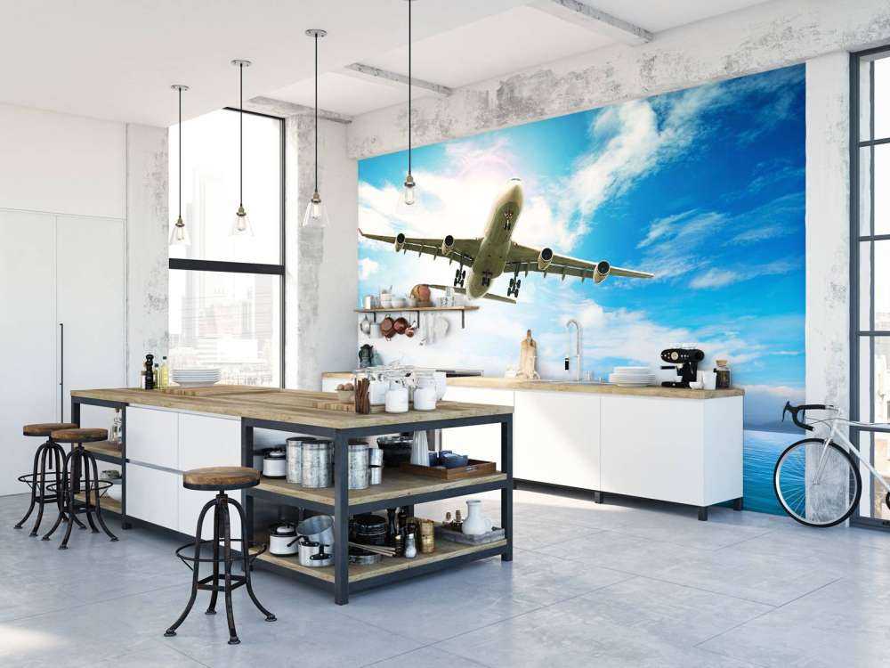 Passagiersvliegtuig boven een tropische zee