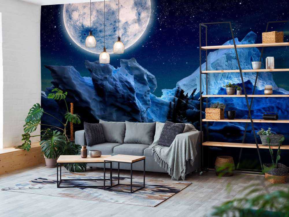 Volle maan boven ijsbergen