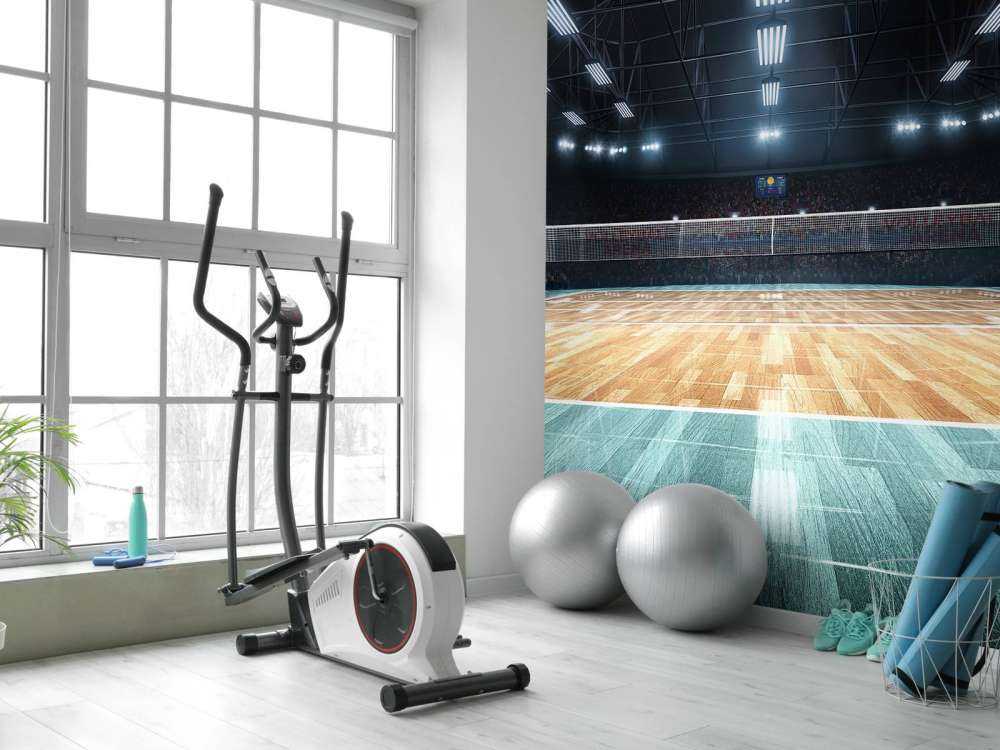 Verlicht volleybalveld met een houten vloer