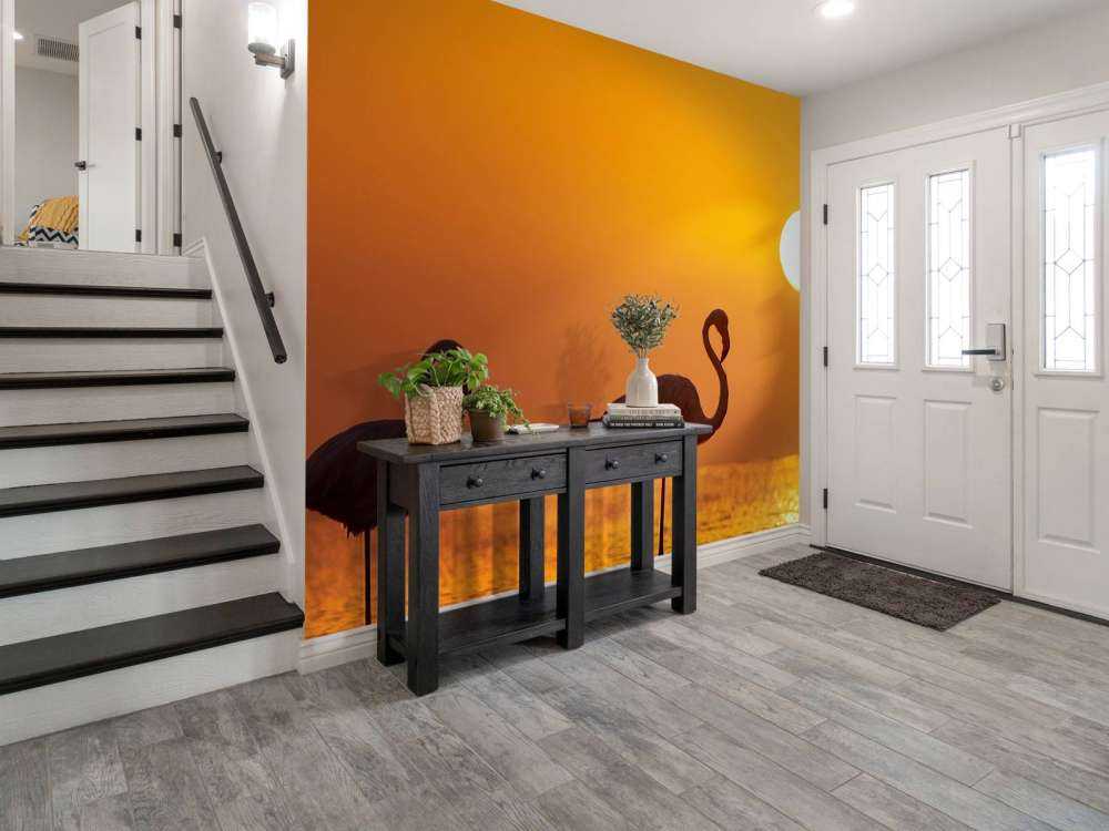 Flamingo's bij zonsondergang