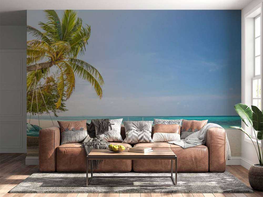 Tropisch strand met schommel