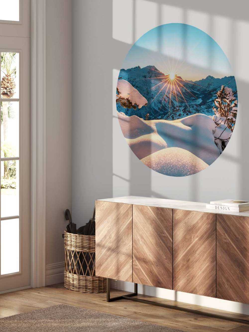 Ochtendzon over besneeuwd dal