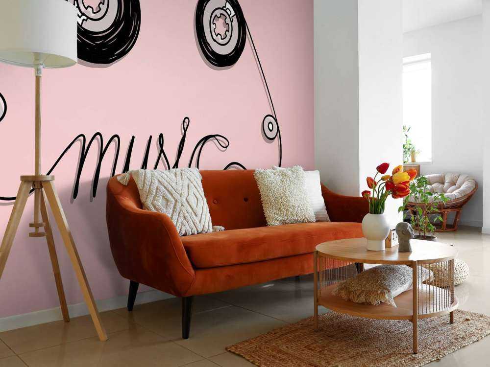 Cassettebandje met een roze achtergrond