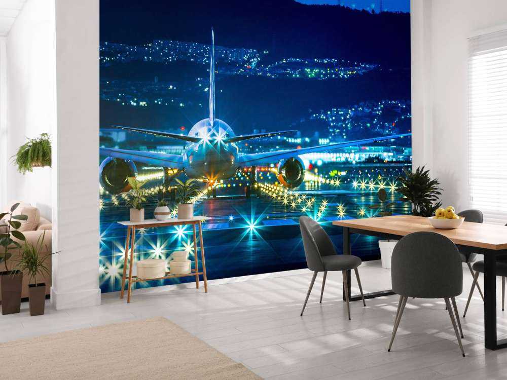 Vliegtuig op een verlicht vliegveld