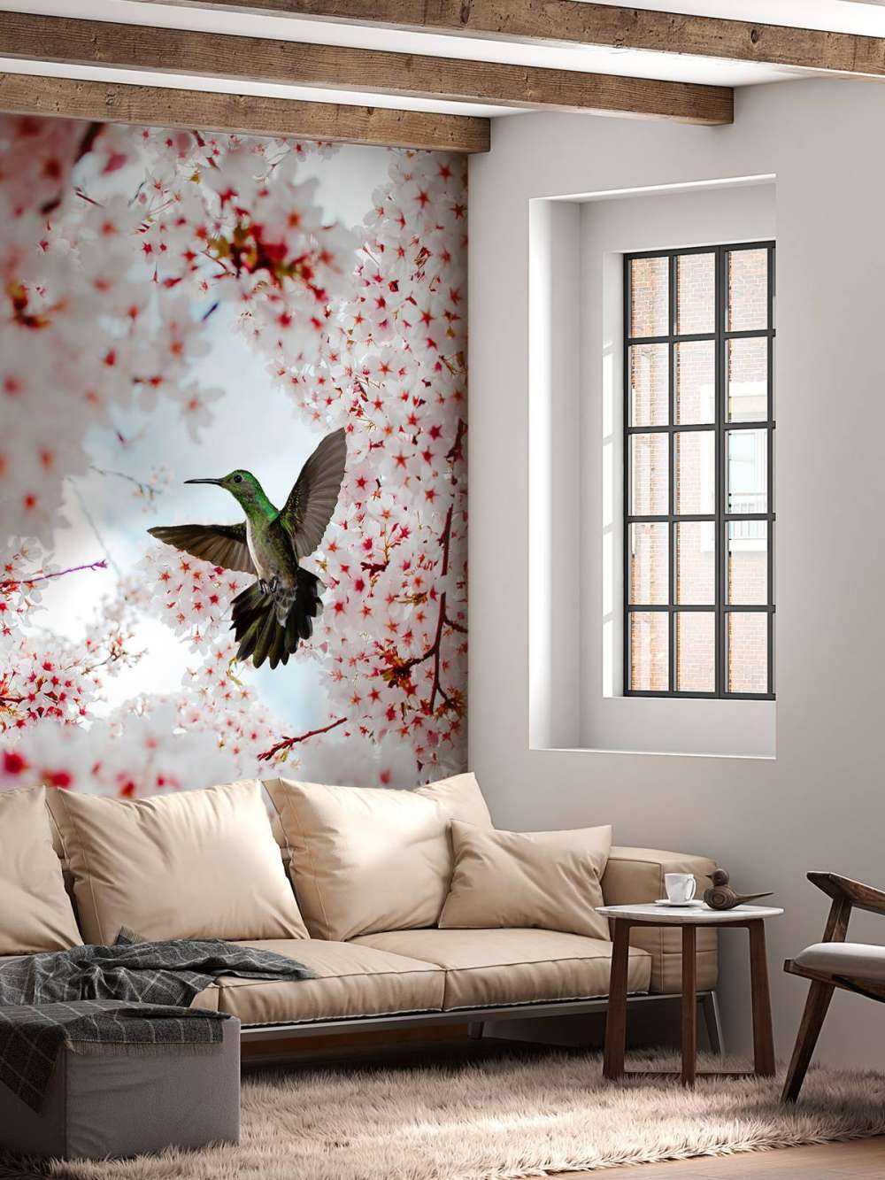 Kolibrie tussen de bloesems