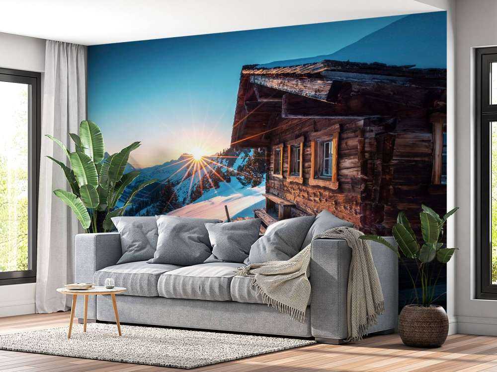 Ochtendlucht bij houten alpenhut