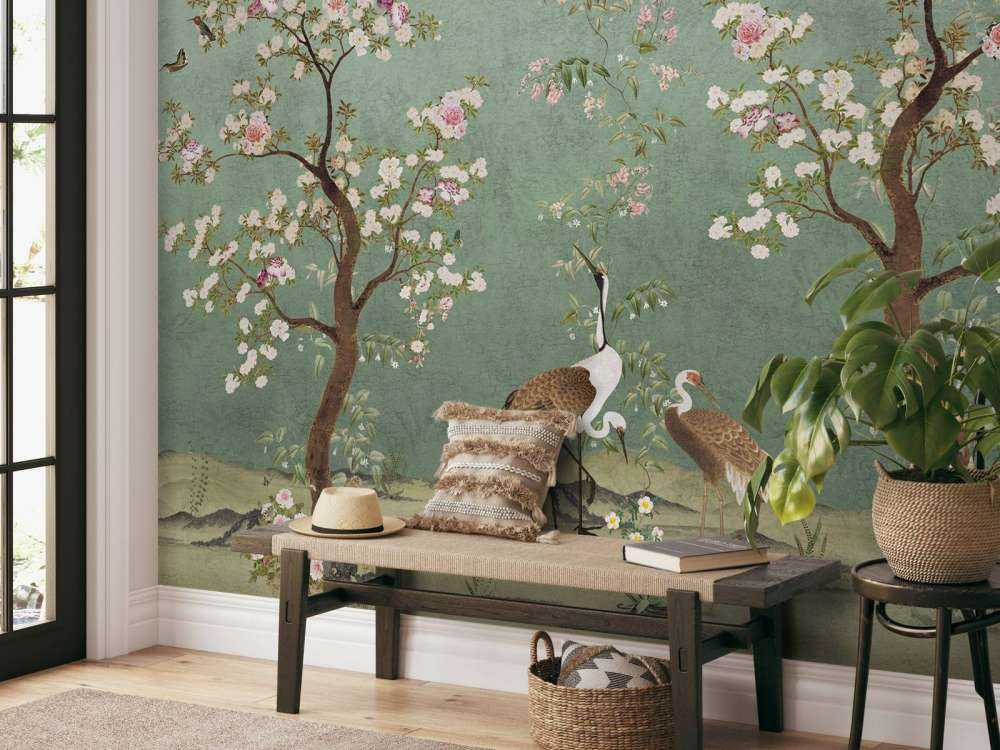 Sierlijke kraanvogels in bloesemlandschap