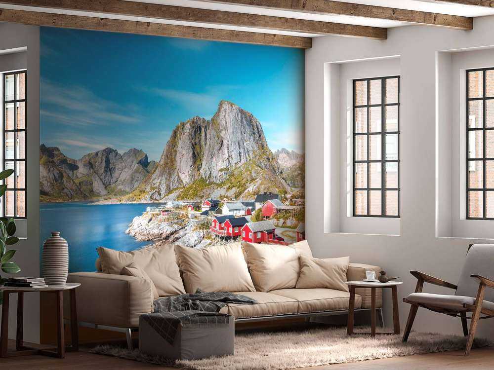 Rode vissershuisjes aan noorse fjord