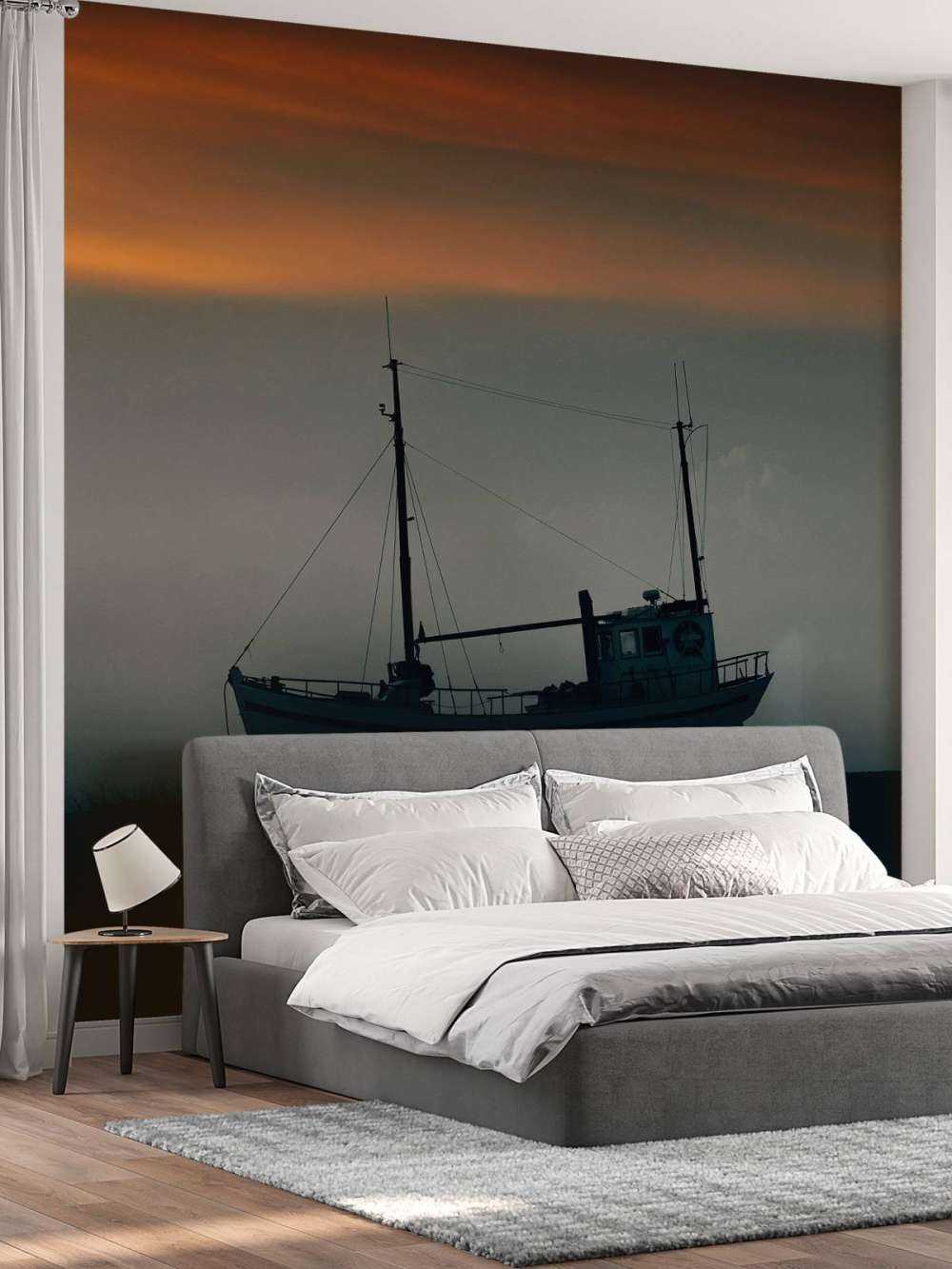 Boot tijdens de zonsondergang