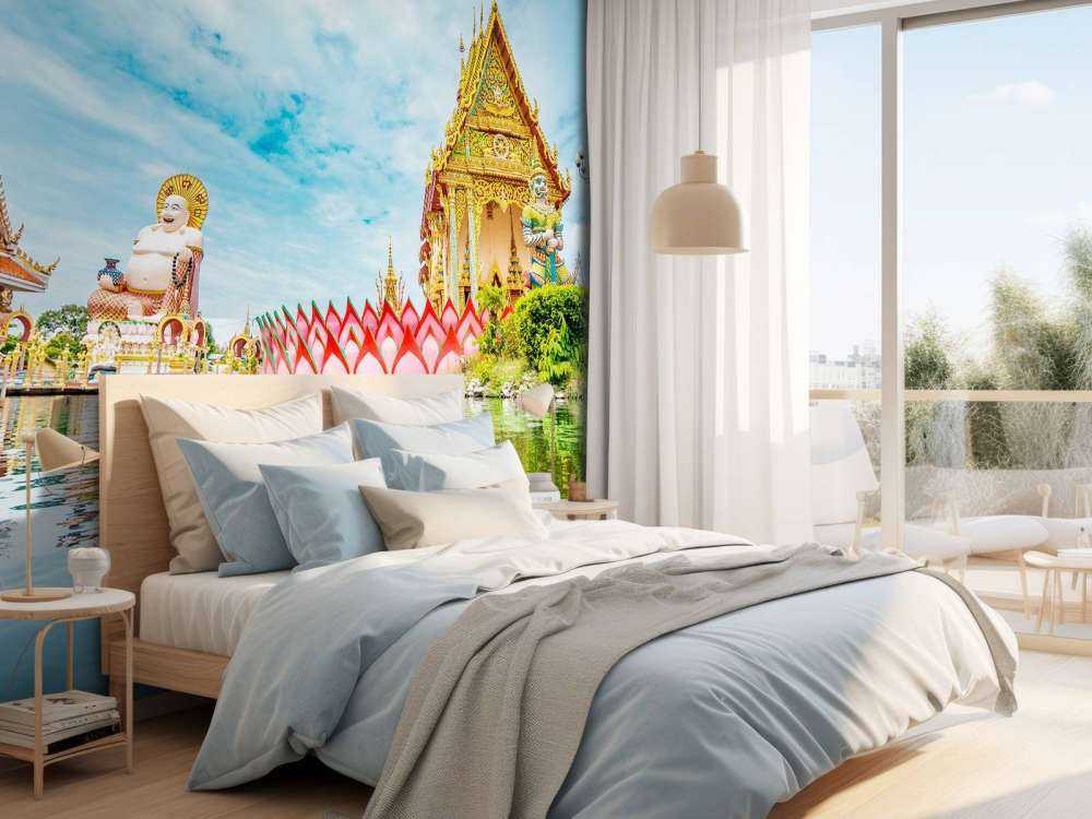 De Wat Plai Laem Boeddhistische tempel met standbeelden