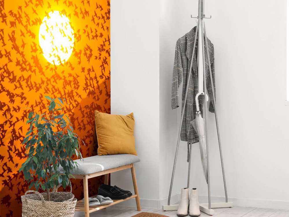 Grote groep vogels bij zonsondergang