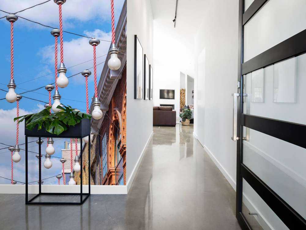 Light bulbs hanging across the buildings for Christmas decorations, London