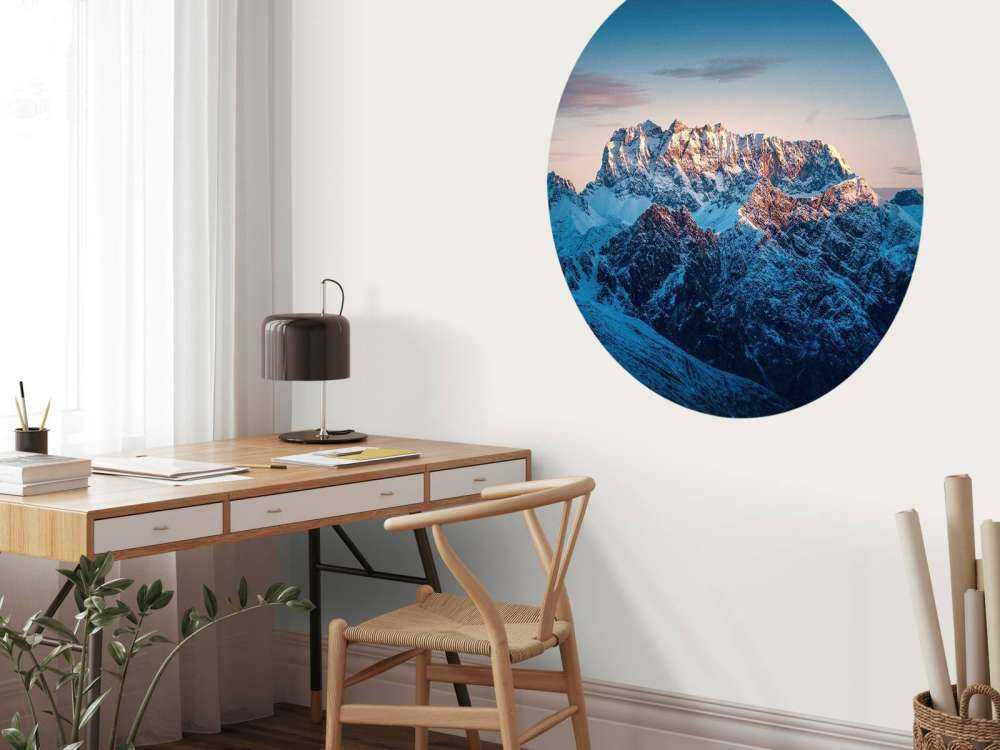 Avondgloed op sneeuwtoppen