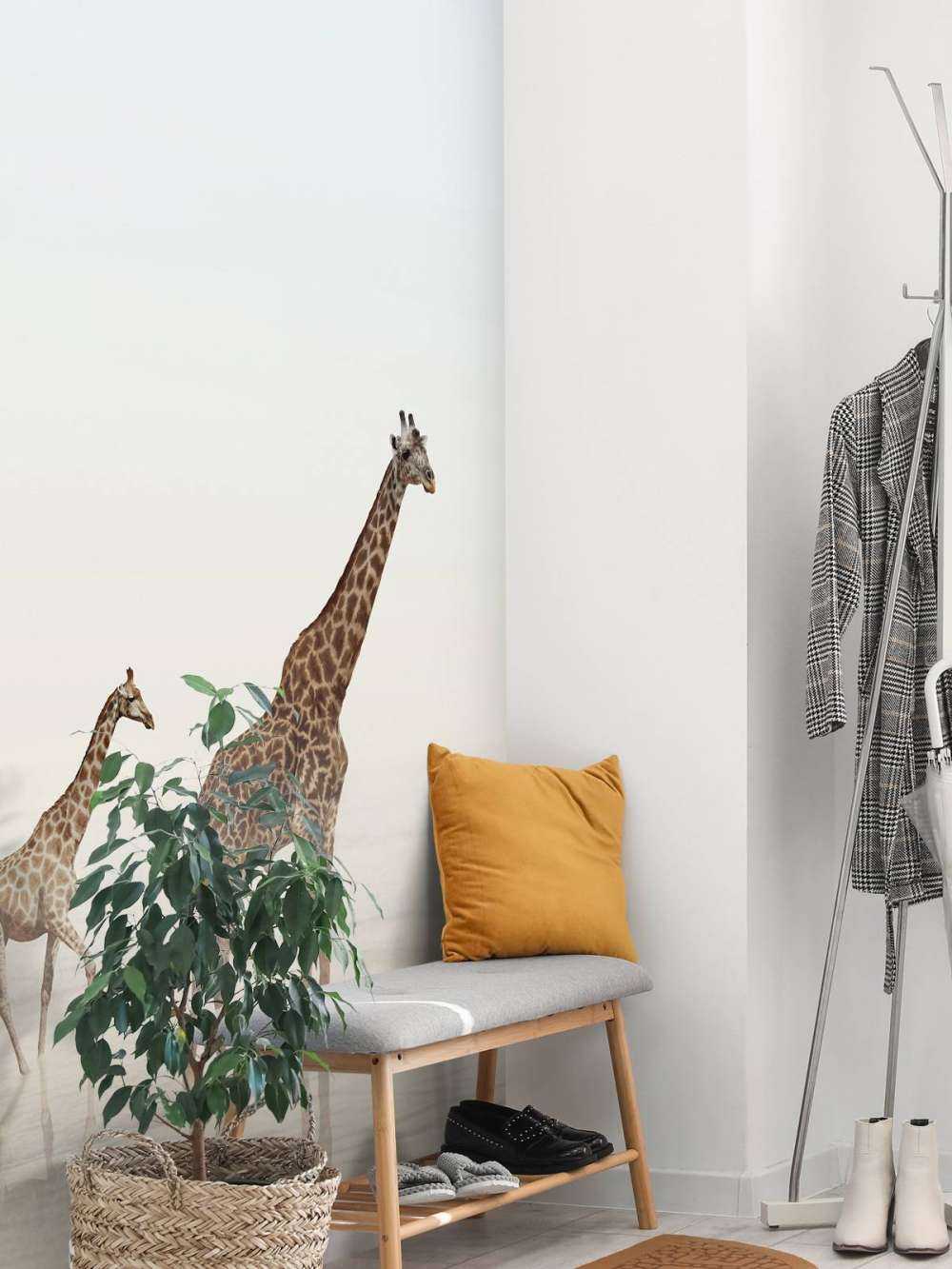 Giraffen op het strand