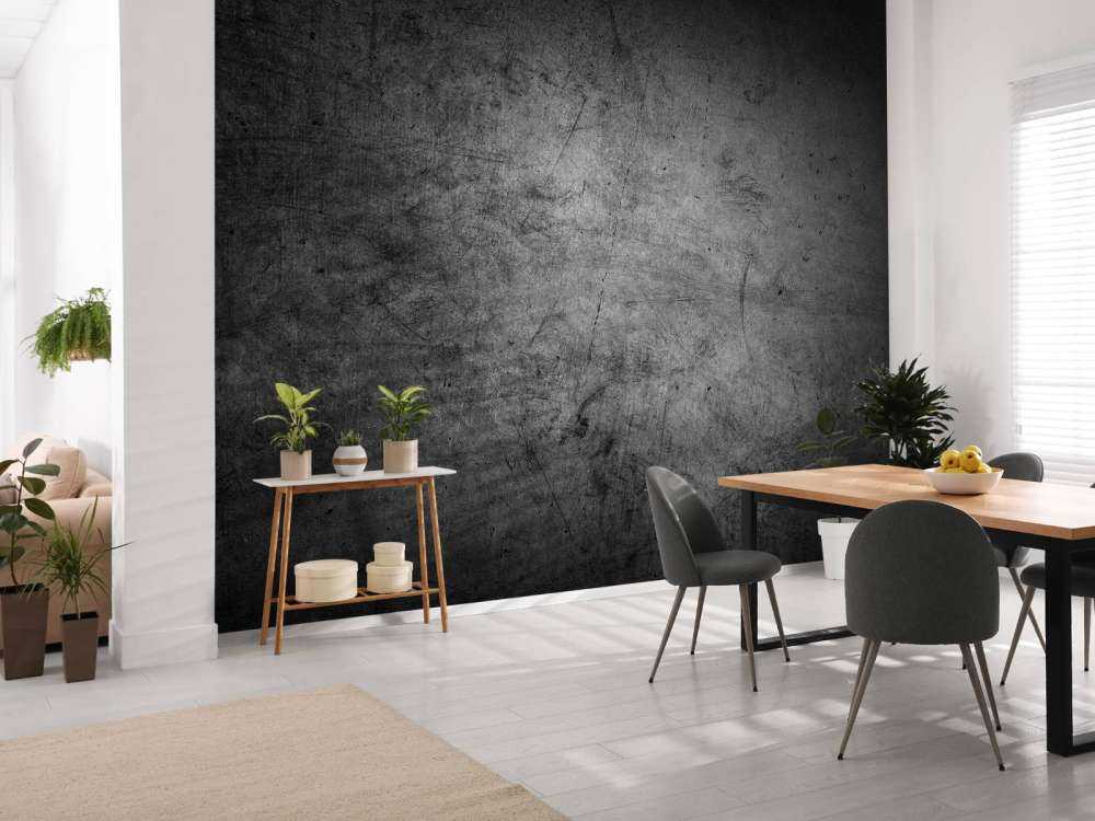 Grijze muur met krassen