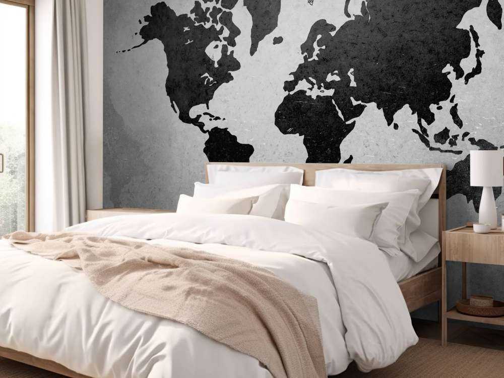 Zwarte wereldkaart op een betonnen muur