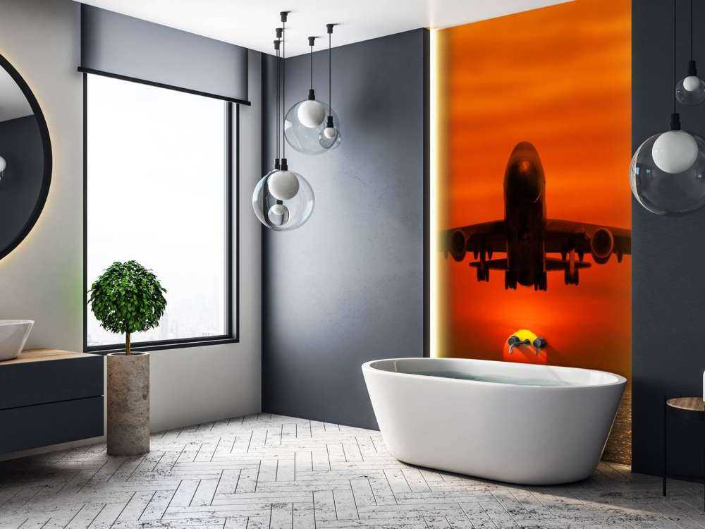 Passagiersvliegtuig boven de zee bij zonsondergang