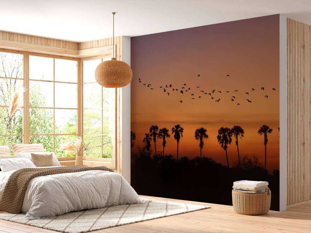 Palmbomen met groep vogels