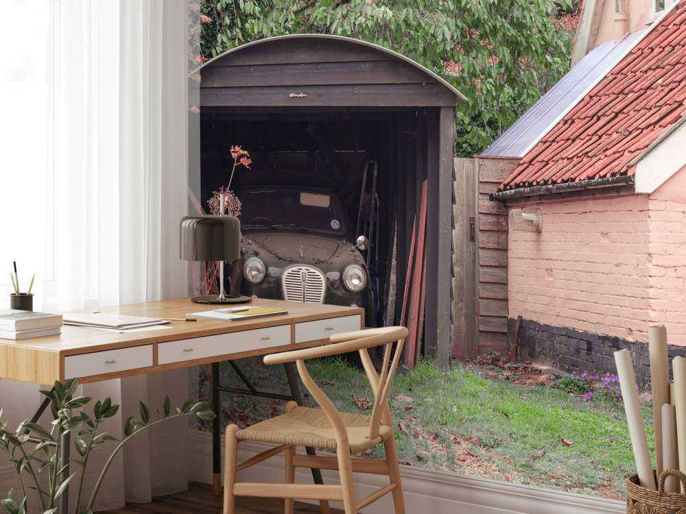 Classic car in garage of old house