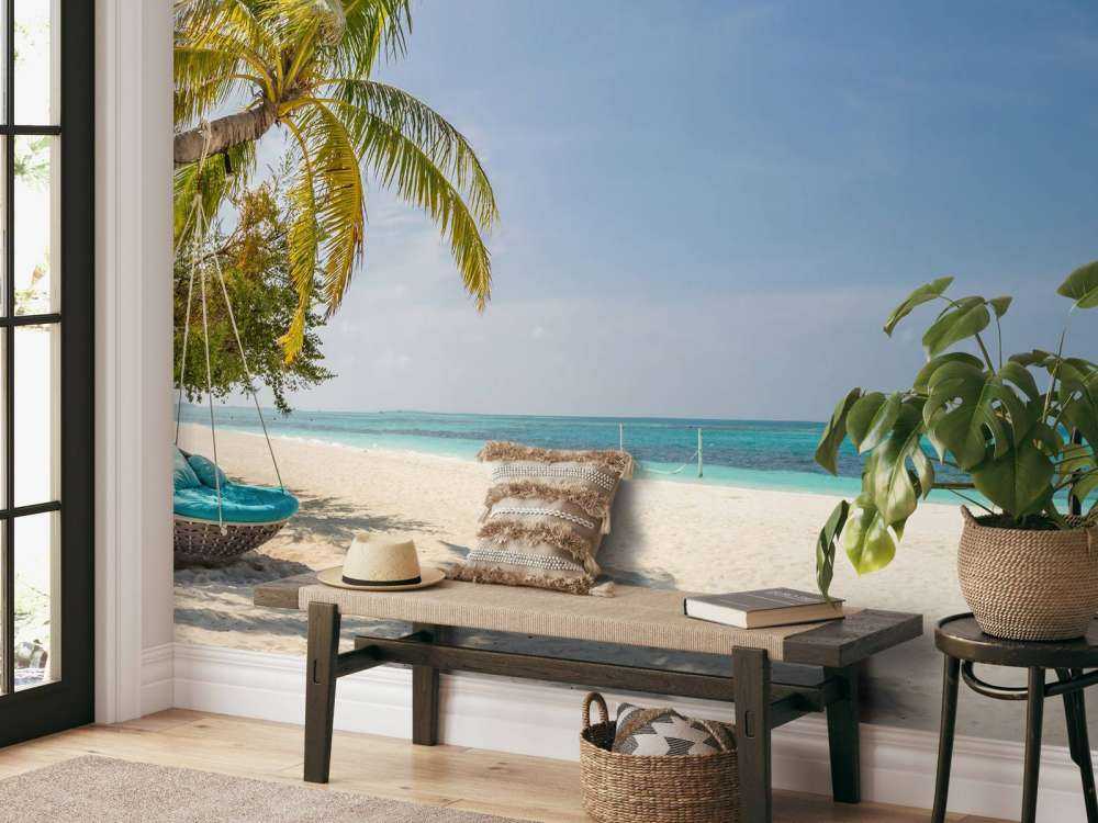 Tropisch strand met schommel