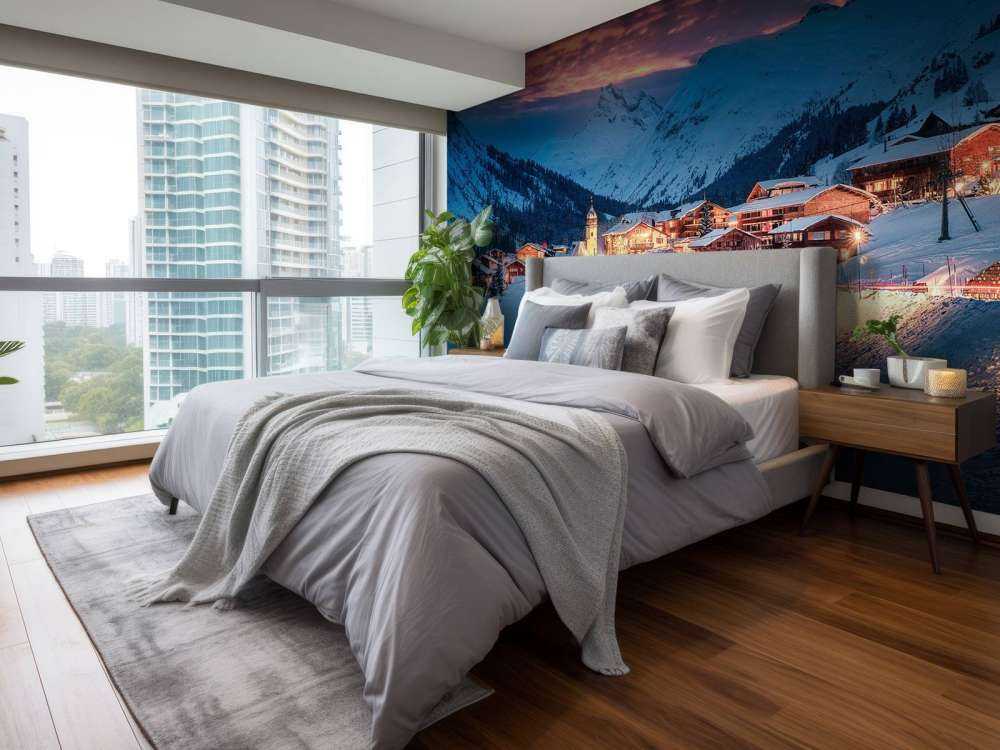 Avondlicht over bergdorp in de sneeuw