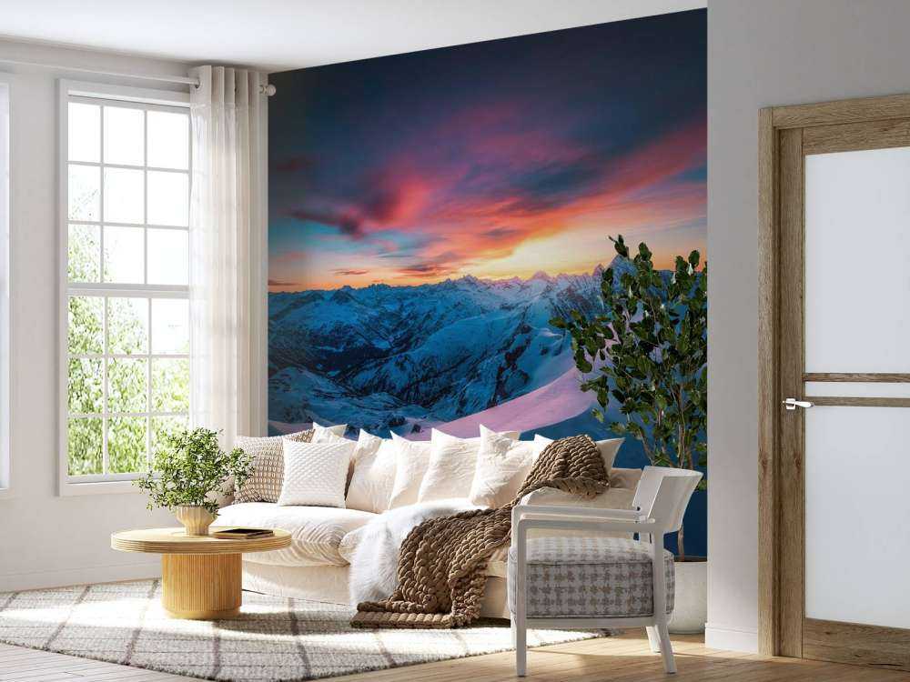 Sneeuwtoppen bij vurige dageraad