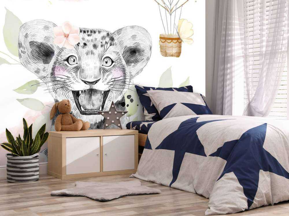 Vrolijke leeuwenwelp en luchtballo