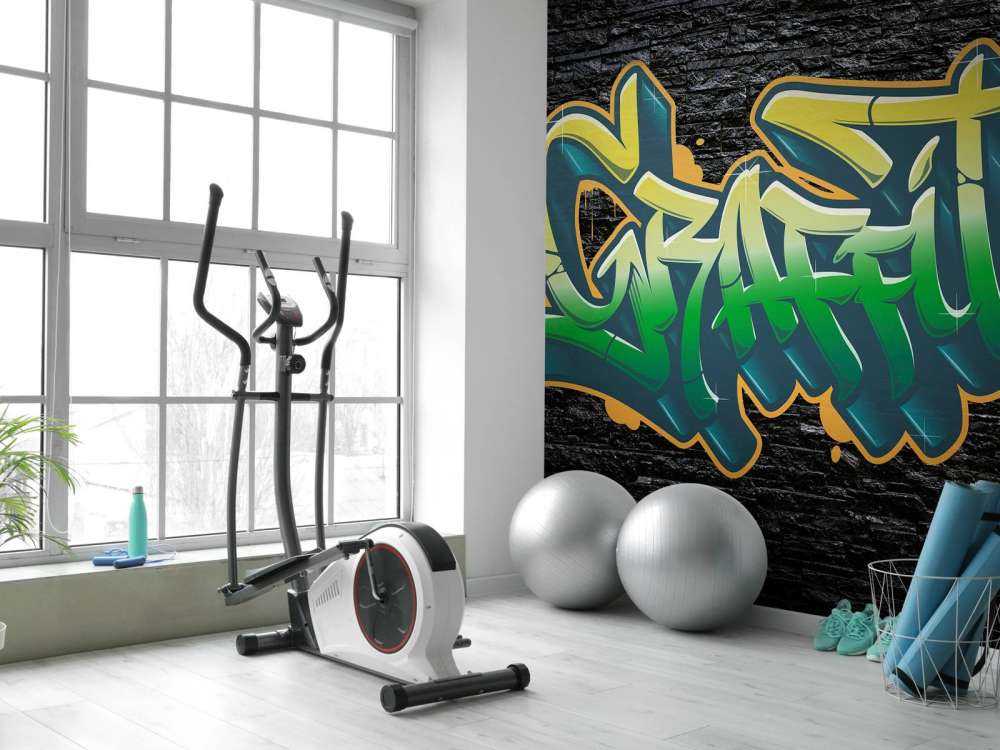 Graffiti op muur van zwarte stenen