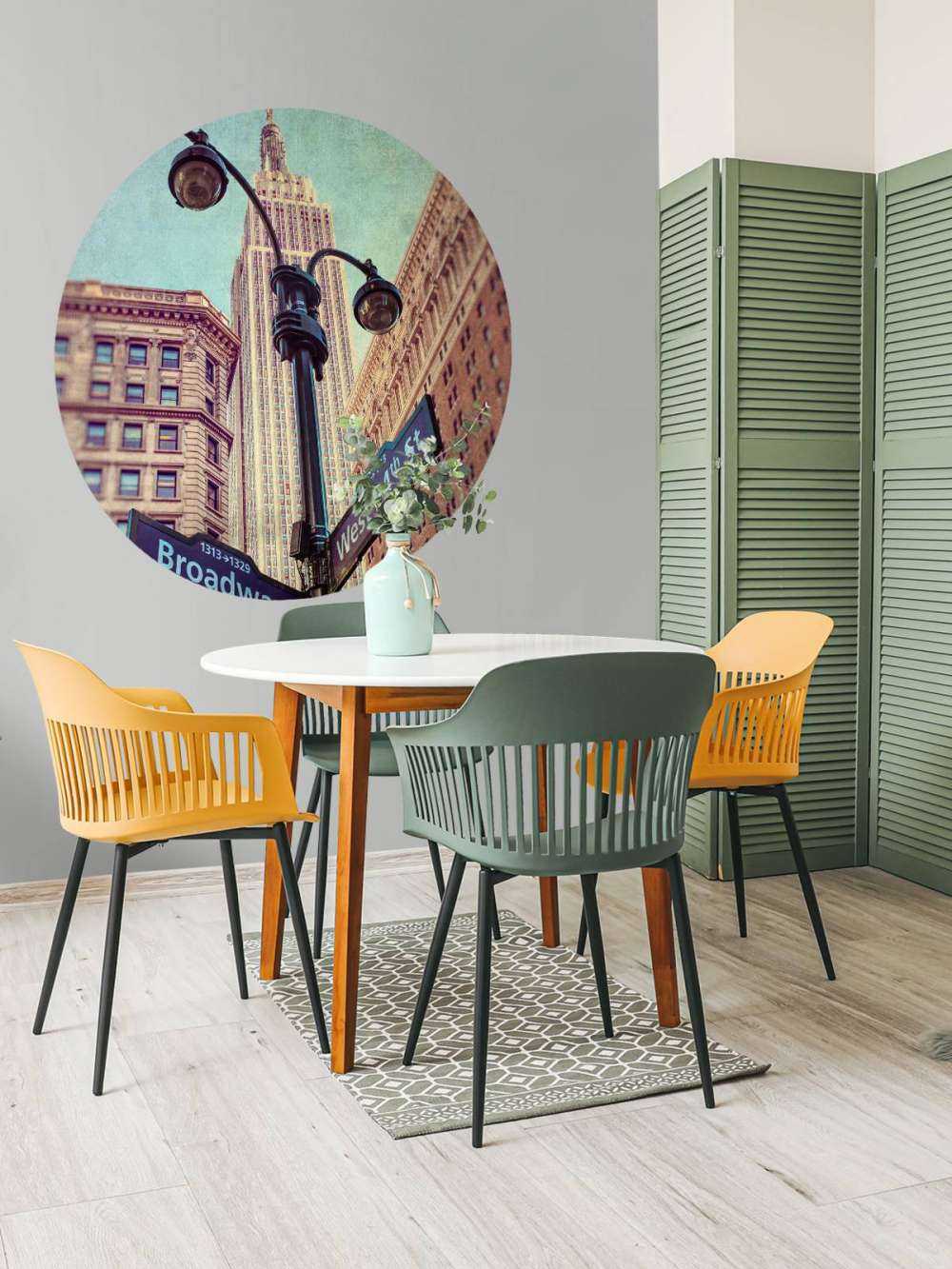 Street lamp and street signs with Empire State building in background - New York