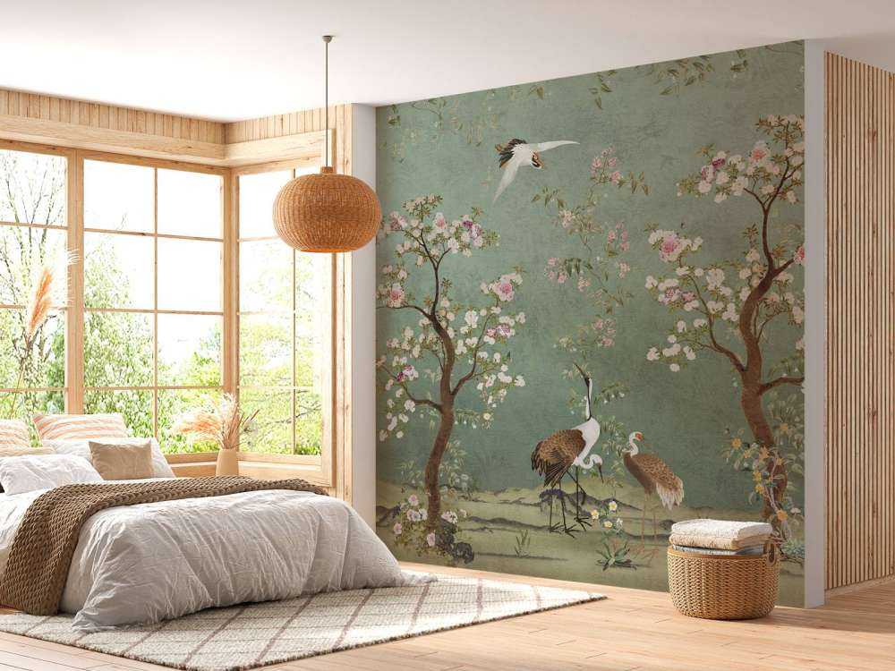 Sierlijke kraanvogels in bloesemlandschap